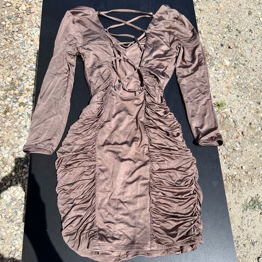 Brown Bebe Dress in size Small. Figure fitting, beautiful snug fit. Classy look.